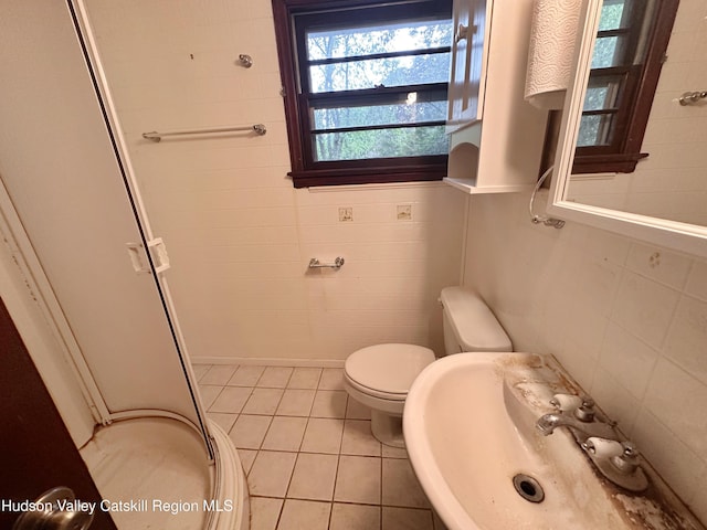 1918 County Route 8, Elizaville, NY 12523 - bathroom with a shower stall, a sink, tile patterned floors, toilet, and tile walls