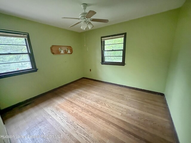 1918 County Route 8, Elizaville, NY 12523 - unfurnished room featuring light wood finished floors, baseboards, and a ceiling fan