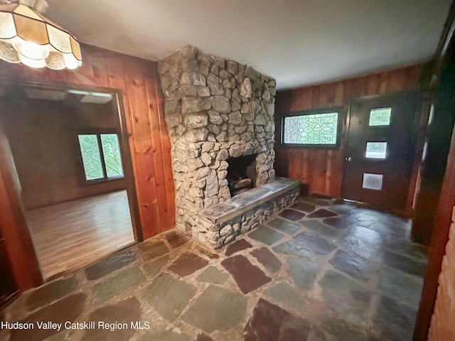 1918 County Route 8, Elizaville, NY 12523 - foyer entrance featuring stone floors, wood walls, and a stone fireplace