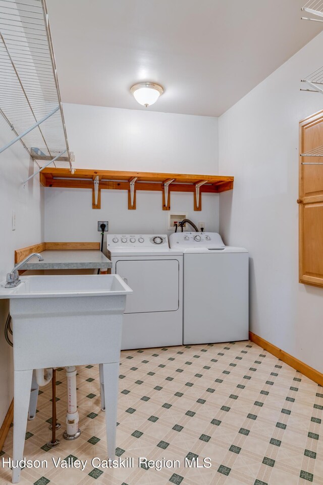 laundry room with separate washer and dryer