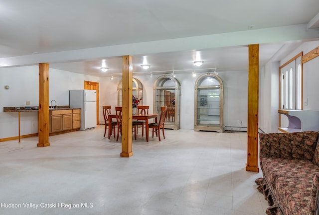 dining area featuring sink