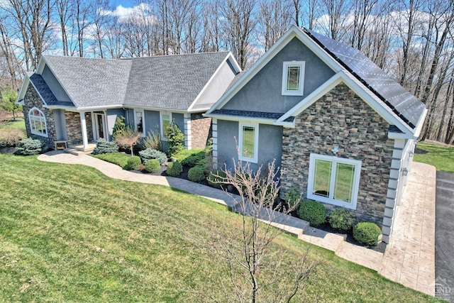 52 Hadley Dr, New Baltimore, NY 12087 - craftsman inspired home featuring stone siding, stucco siding, solar panels, and a front yard