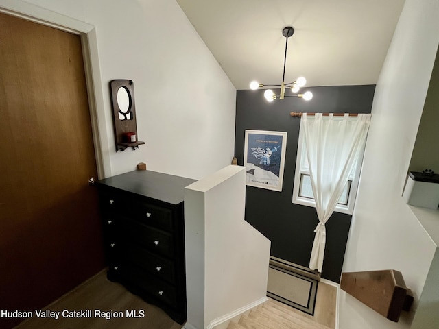 72 Hunter Dr Unit L-1, Hunter, NY 12442 - staircase with a chandelier and lofted ceiling