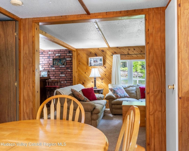 315 Begley Rd, Windham, NY 12496 - carpeted dining space featuring wooden walls and a textured ceiling