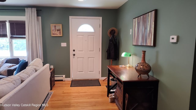 56 Church St, Plattekill, NY 12589 - foyer entrance featuring baseboard heating and light wood-style floors