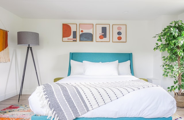 bedroom featuring light wood-type flooring