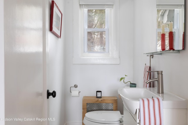 half bathroom with toilet