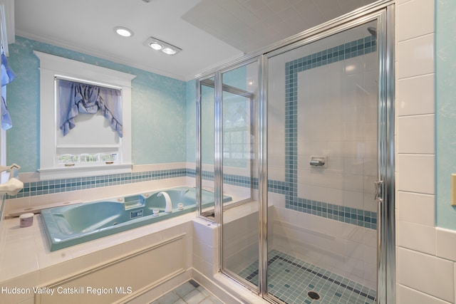 full bathroom with a tub with jets, a shower stall, ornamental molding, and tile patterned flooring