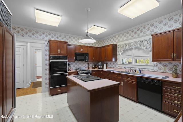 kitchen featuring crown molding, a sink, black appliances, light floors, and wallpapered walls