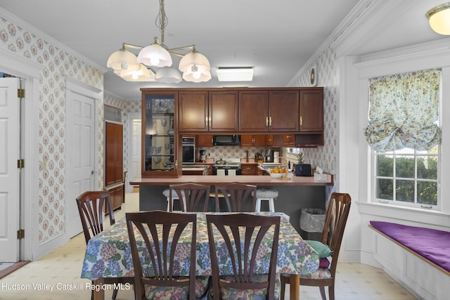 dining space featuring crown molding, wallpapered walls, a notable chandelier, and light floors