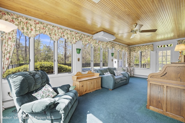 sunroom with an outdoor living space, a ceiling fan, a baseboard heating unit, and a baseboard radiator