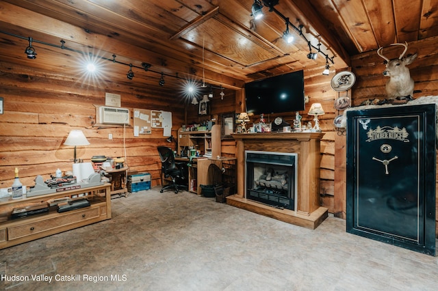 living room with concrete flooring, an AC wall unit, and wood ceiling