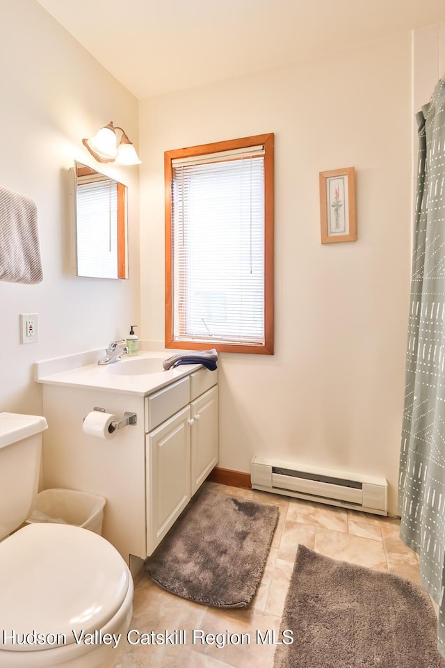 28 Loo Bridge Ln Unit 22A, Windham, NY 12496 - full bath featuring baseboard heating, vanity, tile patterned floors, and a shower with curtain
