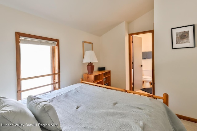 28 Loo Bridge Ln Unit 22A, Windham, NY 12496 - bedroom with multiple windows, lofted ceiling, and connected bathroom