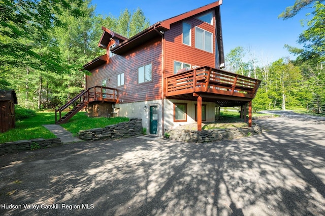 59 Mountain Dr, Hunter, NY 12442 - rear view of property with a patio, a wooden deck, and stairway