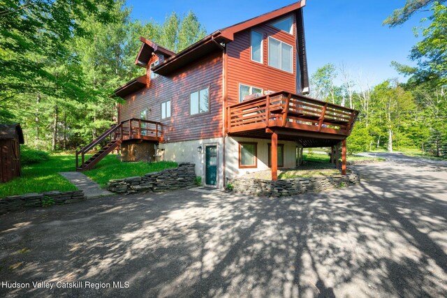 59 Mountain Dr, Hunter, NY 12442 - rear view of property with a patio, a wooden deck, and stairway