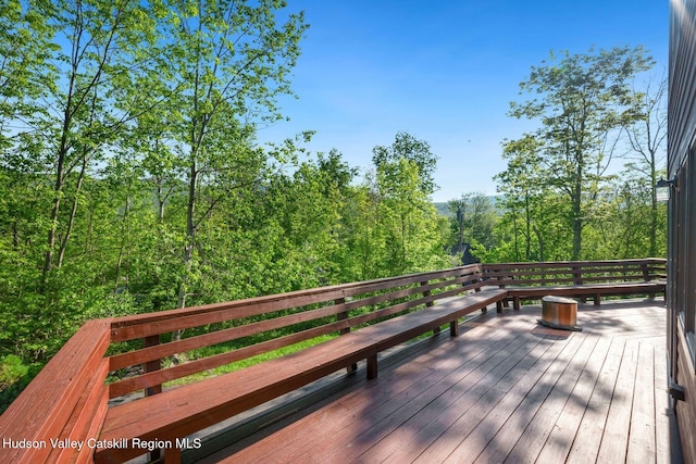 59 Mountain Dr, Hunter, NY 12442 - wooden deck with a wooded view