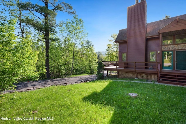 59 Mountain Dr, Hunter, NY 12442 - view of grassy yard with a wooden deck