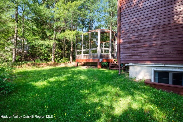59 Mountain Dr, Hunter, NY 12442 - view of green lawn featuring a wooden deck