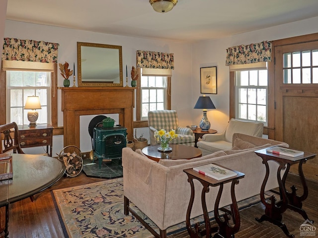 2456 State Route 82, Ancram, NY 12502 - living room with a wood stove, plenty of natural light, and wood finished floors
