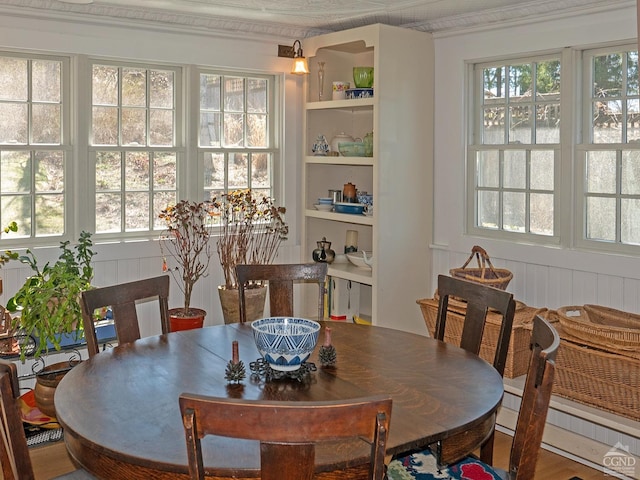 2456 State Route 82, Ancram, NY 12502 - dining area with plenty of natural light, built in features, and ornamental molding