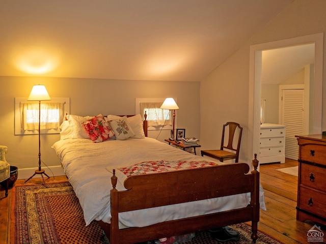 2456 State Route 82, Ancram, NY 12502 - bedroom featuring hardwood / wood-style flooring and lofted ceiling