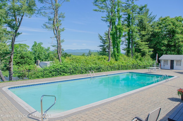 view of pool featuring a mountain view