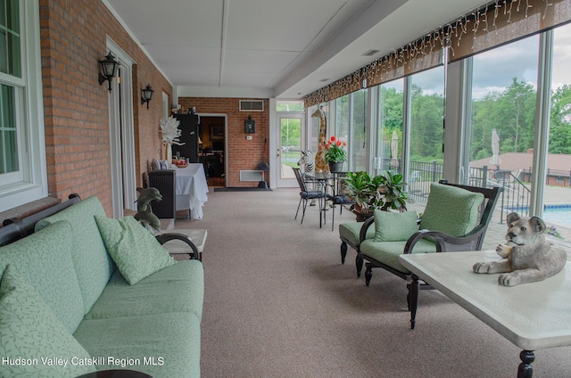 sunroom / solarium with plenty of natural light