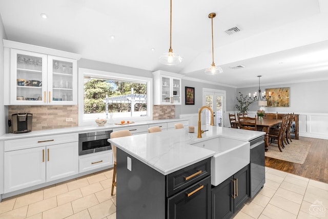30 Clinton Hollow Rd, Pleasant Valley, NY 12578 - kitchen featuring a sink, stainless steel dishwasher, white cabinetry, plenty of natural light, and ornamental molding