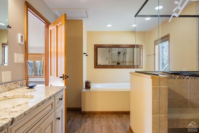 213 Botti Dr, Hunter, NY 12442 - bathroom with tiled shower, vanity, wood finished floors, a garden tub, and plenty of natural light