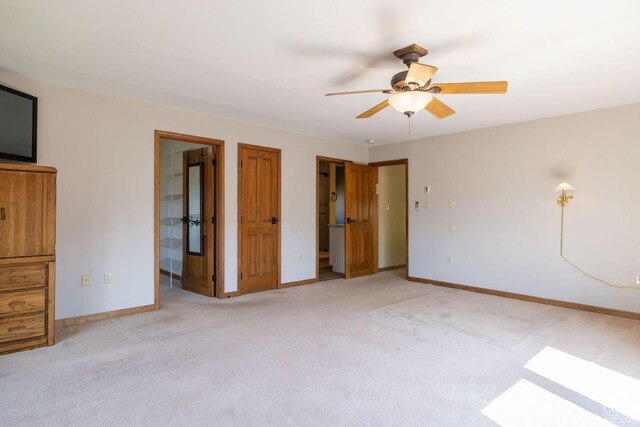 213 Botti Dr, Hunter, NY 12442 - unfurnished bedroom featuring light carpet, ensuite bath, and a ceiling fan