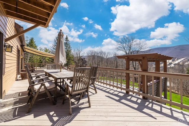213 Botti Dr, Hunter, NY 12442 - wooden deck featuring a mountain view and outdoor dining area