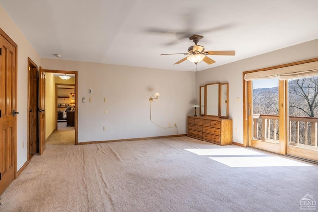 213 Botti Dr, Hunter, NY 12442 - unfurnished bedroom featuring light colored carpet, access to outside, and a ceiling fan