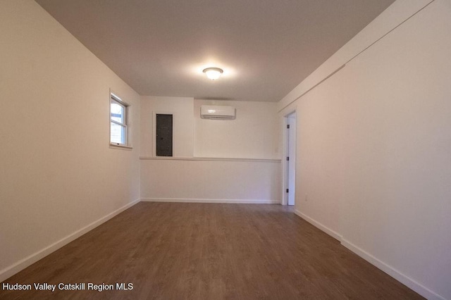 11 Old Farm Rd, Napanoch, NY 12458 - empty room with electric panel, baseboards, wood finished floors, and a wall mounted air conditioner