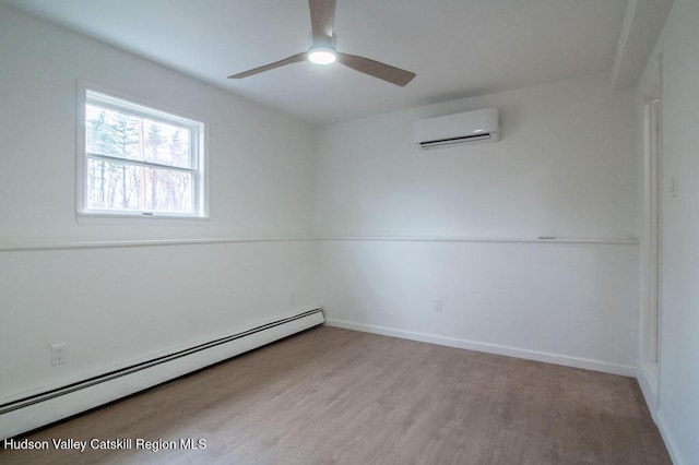11 Old Farm Rd, Napanoch, NY 12458 - unfurnished room featuring ceiling fan, a wall mounted AC, a baseboard heating unit, wood finished floors, and baseboards