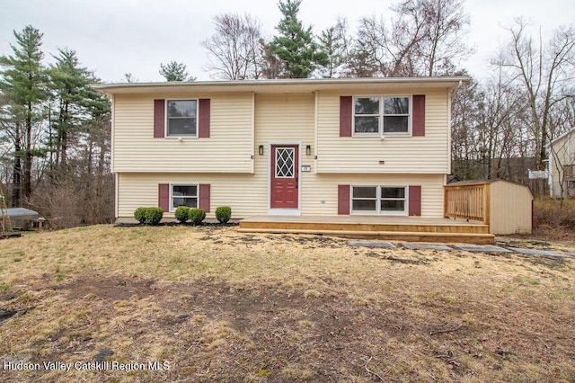11 Old Farm Rd, Napanoch, NY 12458 - bi-level home with a wooden deck and a front yard