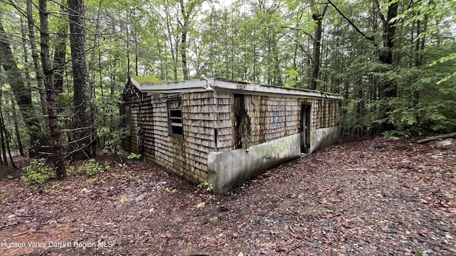 14 Saw Pitt Rd, Kerhonkson, NY 12446 - view of outdoor structure featuring a wooded view