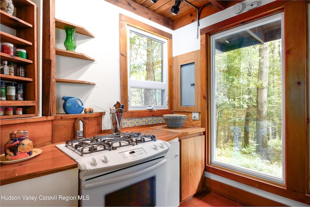 159 Pine Ln, Saugerties, NY 12477 - kitchen featuring white range with gas cooktop, wooden ceiling, wood counters, and open shelves