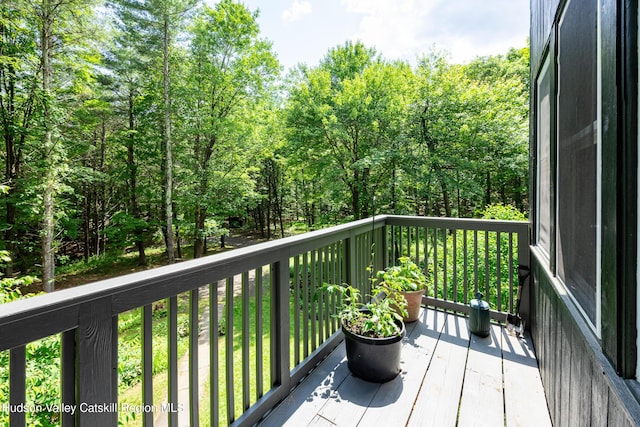 159 Pine Ln, Saugerties, NY 12477 - wooden terrace with a view of trees