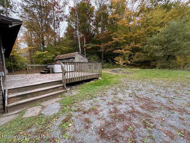 view of yard featuring a deck