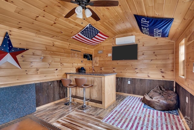 311 County Route 13, Old Chatham, NY 12136 - bar area with a wall mounted AC, wood ceiling, vaulted ceiling, wood walls, and ceiling fan