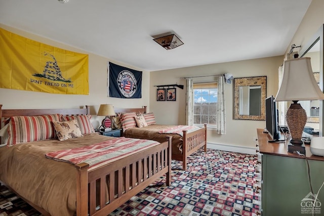 311 County Route 13, Old Chatham, NY 12136 - bedroom with baseboards, a baseboard heating unit, and tile patterned floors