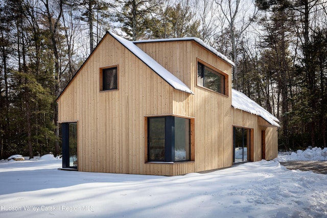 view of snow covered property