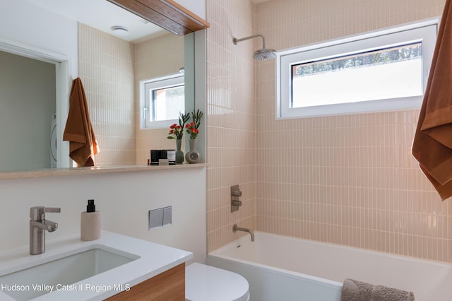 full bathroom featuring toilet, bathtub / shower combination, and vanity