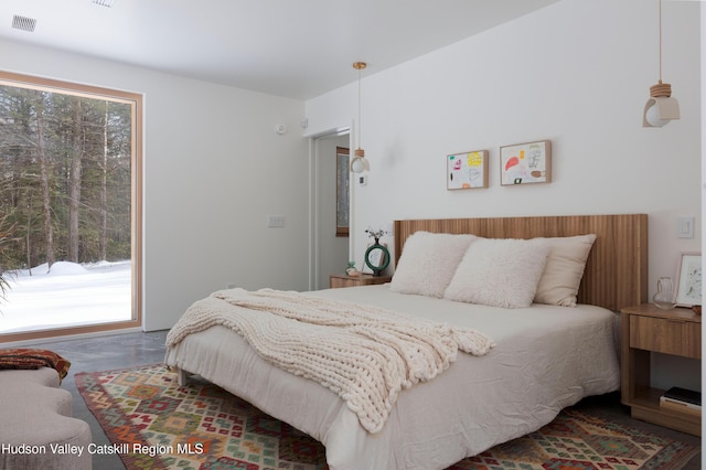 bedroom featuring visible vents