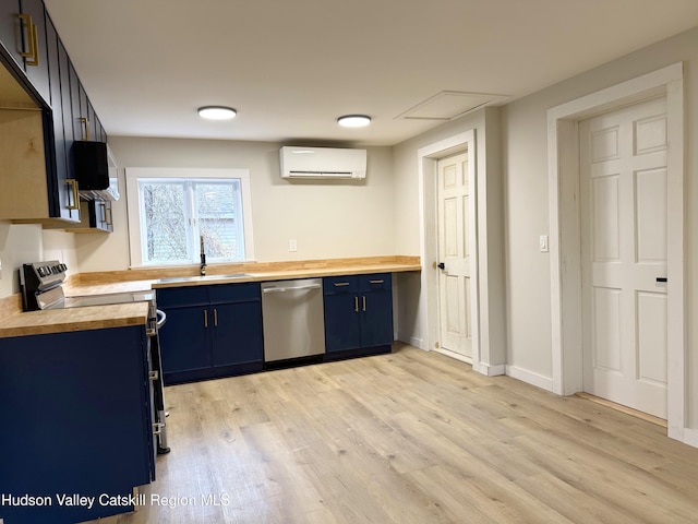 kitchen featuring butcher block counters, sink, stainless steel dishwasher, a wall mounted AC, and light hardwood / wood-style floors