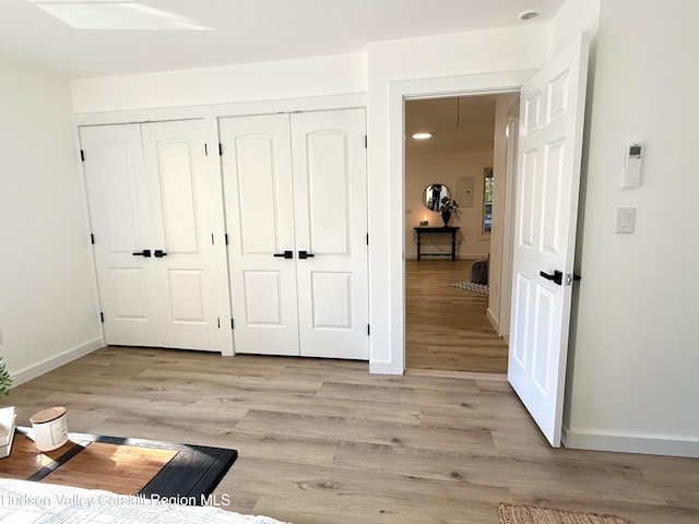 unfurnished bedroom featuring light hardwood / wood-style floors