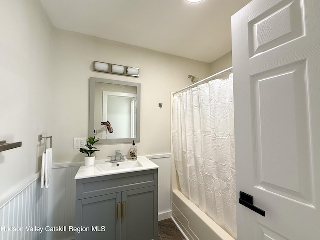 bathroom with vanity and shower / bathtub combination with curtain