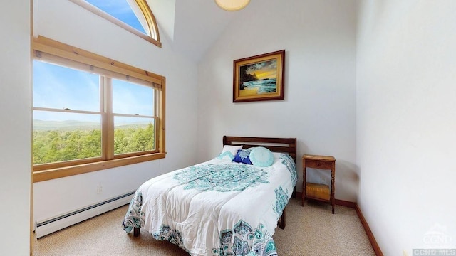 33 Elm Ridge Rd, Windham, NY 12496 - bedroom featuring a baseboard heating unit, carpet floors, vaulted ceiling, and baseboards