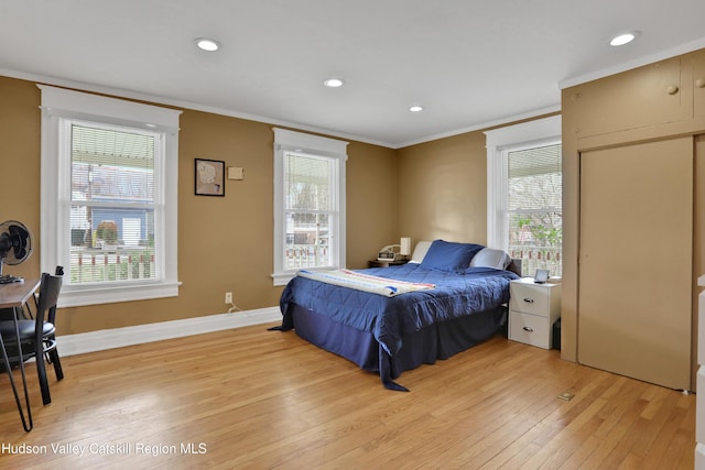 20-22 Milton Ave, Highland, NY 12528 - bedroom featuring crown molding, light wood-type flooring, multiple windows, recessed lighting, and baseboards